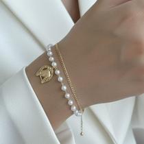 Pulseira Dupla Ferradura Cavalo Com Pérolas Banhada a Ouro