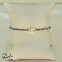 Pulseira em hematita facetada e espírito santo em madrepérola folheado em ouro 18k Pulseira em hematita facetada e espírito santo em madrepérola folheado em ouro 18k