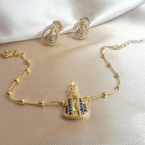 Pulseira Feminina Nossa Senhora Aparecida Banhada a Ouro 18k com 10 Milésimos e Zircônias Azuis Pulseira Feminina Nossa Senhora Aparecida Banhada a Ouro 18k com 10 Milésimos e Zircônias Azuis