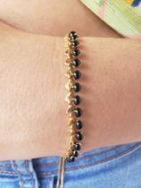 Pulseira gravata com resina pretas banhada em ouro 18k