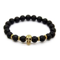 Pulseira masculina pedra lava vulcânica com caveira dourada