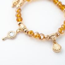 Pulseira Oxum do Amor Acessórios Cristal Dourado e Silicone Pulseira Oxum do Amor Acessórios Cristal Dourado e Silicone