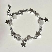 pulseira perola com estrelas