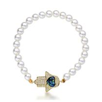 Pulseira pérolas com passante mão de hansan cravejada com mosaico de madrepérola Pulseira pérolas com passante mão de hansan cravejada com mosaico de madrepérola