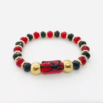 Pulseira Pomba gira Firma dourada cristal e silicone