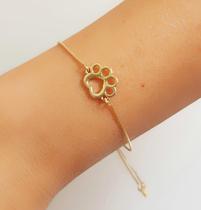 Pulseira Regulável Patinha Vazada Banhado em Ouro 18K