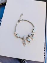 Pulseiras folheadas a prata personalizadas com berloques