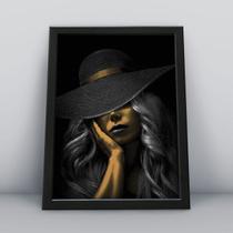 Quadro com molduraface mulher dourada Quadro com molduraface mulher dourada