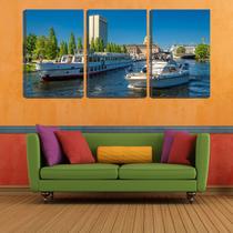 Quadro Decorativo 68x126 barcos no rio na cidade