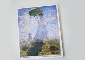Quebracabeça Monet 48 peças Mulher com sombrinha 20x25cm
