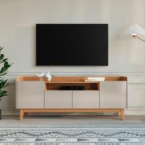 Rack para TV até 60 Polegadas MDF 158cm Pés em Madeira Maciça 4 Portas 1 Nicho Adria Versátile Bege Off White/Noce Rack para TV até 60 Polegadas MDF 158cm Pés em Madeira Maciça 4 Portas 1 Nicho Adria Versátile Bege Off White/Noce