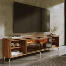 Rack para TV Até 85” 1 Porta com Vidro Reflecta e LED Lincoln Float 212 cm - Canella c/ Champanhe Rack para TV Até 85” 1 Porta com Vidro Reflecta e LED Lincoln Float 212 cm - Canella c/ Champanhe