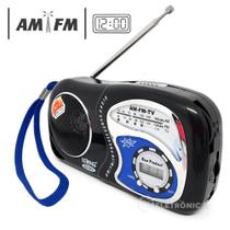 Rádio Relógio Analógico Leve Compacto Am Fm Jogo Musica Com Alça Transporte LE603