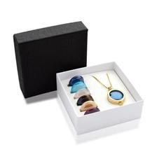 Relicário com 7 cristais perolados Relicário com 7 cristais perolados