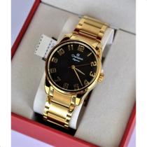 Relogio champion feminino dourado grande visor preto cn27652u numeros