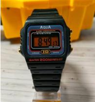 Relógio Digital Aqua Aq37 fundo laranja detalhes dourados