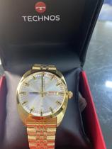 Relógio em aço dourado automático technos