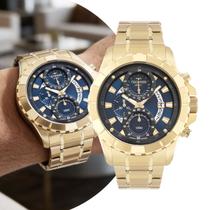 Relógio Masculino Analógico de Pulso Dourado e Azul com Caixa e Pulseira de Aço Inoxidável à Prova D Água Luxo Casual Social Technos Legacy