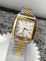 Relógio masculino Technos prata c/ detalhes dourados