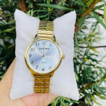 Relogio mondaine feminino dourado com pulseira esteira de esticar