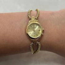 Relógio mondaine feminino dourado delicado pequeno 32957lpmvde1