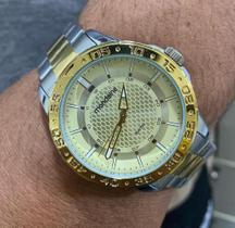 Relógio mondaine masculino prata e dourado á prova d'água 32550gpmvbe5