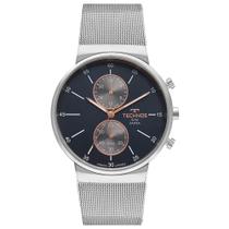 Relógio Technos Masculino Slim Prata Vd36aB 1a Fundo Azul Relógio Technos Masculino Slim Prata Vd36aB 1a Fundo Azul