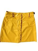 Saia de material ecológico com botões amarelo m 3 Marias