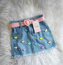Saia jeans com cinto bordada