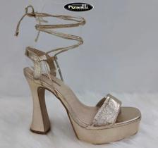 Sandália de salto alto de amarrar dourada