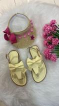 Sandália infantil feminina na cor dourada tamanho 25