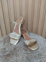 Sandália Modelo Tamanco De Festa Na Cor Ouro Light Sandália Modelo Tamanco De Festa Na Cor Ouro Light