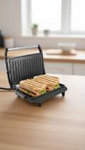 Sanduicheira Grill Elétrica Press Inox 850W Sanduicheira Grill Elétrica Press Inox 850W
