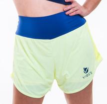 Short duplo amarelo claro com cós e faixa lateral e azul marinho Short duplo amarelo claro com cós e faixa lateral e azul marinho
