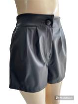 SHORTS material sintético
