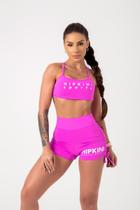 Shorts movement rosa com amarracao hipkini Shorts movement rosa com amarracao hipkini