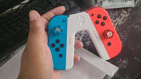 Suporte Controle Nintendo Switch Joy-Con - Grip Em V