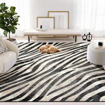 Tapete Abani Terra com padrão zebra preto e creme 61 x 91 cm