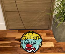 Tapete capacho palhaço grande e muito resistente.