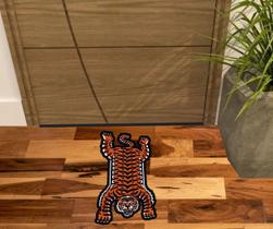 Tapete para decoração tigre laranja no formato. Tapete para decoração tigre laranja no formato.