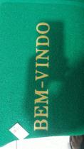 Tapete verde bem-vindo