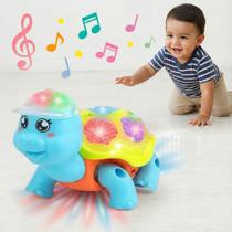 Tartaruga Brinquedo Infantil Musical com Luzes e Som Brinquedo Dançante e Interativo Bebês Estimula Coordenação e Desenvolvimento Sensorial Kizumba Tartaruga Brinquedo Infantil Musical com Luzes e Som Brinquedo Dançante e Interativo Bebês Estimula Coordenação e Desenvolvimento Sensorial Kizumba