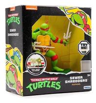 Tartaruga Ninja Caos Mutante Sewer Shredders- Boneco Botão Ação C/ Skate Puxe Correr Raphael - Candide