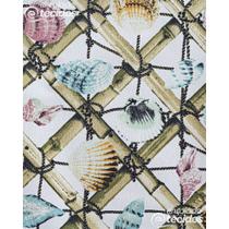 Tecido Impermeável Acqua Mene Conchas Fundo Off White - 1,40m de Largura Tecido Impermeável Acqua Mene Conchas Fundo Off White - 1,40m de Largura