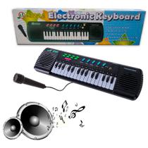 Teclado e Piano Musical 31 Teclas c/ Microfone Teclado e Piano Musical 31 Teclas c/ Microfone