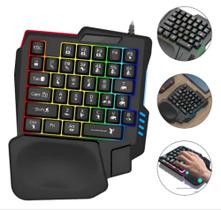 Teclado gamer uma mão onde hand profissional semi mecanico retroiluminado Teclado gamer uma mão onde hand profissional semi mecanico retroiluminado