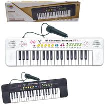 Teclado / piano musical infantil com microfone preto a pilha na caixa wellkids - WELLMIX