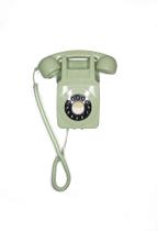 Telefone fixo GPO 746 retrô montado na parede com botão de pressão verde