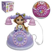 Telefone musical infantil boneca com luz a pilha na caixa
