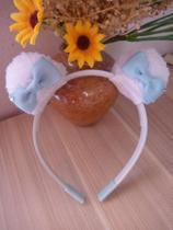 Tiara de pompom de lã
